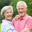 A man and woman posing for the camera.